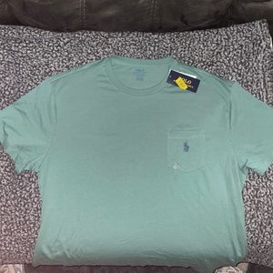 Brand new green polo T shirt. Size L